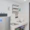 Furnished and Simple Living Studio Serpong Greenview Apartment By Travelio - 切特-希利尔