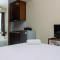 Mini Studio Room Apartment at Tifolia By Travelio