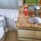 FRODO-APTO 2 dorm, wifi, ar cond suite, vaga garagem