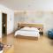 GreenTree Inn Shanghai Jinshan District Wanda Plaza Longhao Road Express Hotel - Хайнань