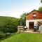 Cottage with a terrace and a view of the valley - Евай