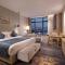 Howard Johnson by Wyndham Jimei Lake Plaza Xiamen - Сямень