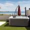 Beachfront villas with hot tubs Sun Garden