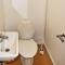 12 person holiday home in Oksvoll