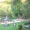 Family holiday home with beautiful garden beside the Ourthe and the RAVeL