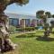 Cavo Orient Beach Hotel & Suites