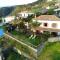 2 bedrooms house with sea view terrace and wifi at Faja da Ovelha 2 km away from the beach