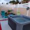 Maison charmante avec vue sur la mer a Petit Canal + Jacuzzi