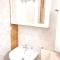 Cozy apartment in Kaštel Štafilić 27 m² with shared pool
