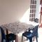 Appartement ensoleille a Goyave 50 m² vue mer et balcon