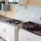 Appartement ensoleille a Goyave 50 m² vue mer et balcon