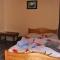 Guest House Mandrivnyi Rooms&Apartments - Yasinya