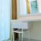 Comfy with Modern Style 1BR Grand Kamala Lagoon Apartment By Travelio