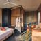 LetsBunk Poshtel & Suites