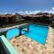 Linda casa Porto das Dunas: 4 suítes, churrasqueira e piscina