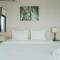 Modern Style 2BR at Tamansari Semanggi Apartment By Travelio