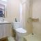 Homey and Warm Studio Apartment Oasis Cikarang By Travelio