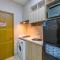 Homey and Warm Studio Apartment Oasis Cikarang By Travelio