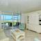 LaPlaya 105B-Relax on the balcony and watch the dolphins swim by and the pelicans dive!