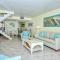 LaPlaya 105B-Relax on the balcony and watch the dolphins swim by and the pelicans dive!