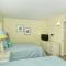 LaPlaya 105B-Relax on the balcony and watch the dolphins swim by and the pelicans dive!