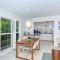 LaPlaya 101A Step out to the beach from your screened lanai Light and bright end unit