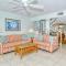 LaPlaya 201C Breathtaking Gulf panorama from this corner end unit with a private stairway to the beach