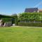 De achtertuin