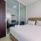 Elegant with Modern Design 1BR Apartment at Atlanta Residences By Travelio