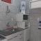 Flat familiar com ar,wi fi,cozinha e garagem