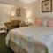 Carlton House Motel and Suites