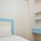 Gorgeous 2BR Green Pramuka Apartment By Travelio