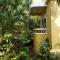 Palm Grove Cottages - Leisure Resort