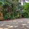 Palm Grove Cottages - Leisure Resort