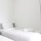 Chic and Comfy 2BR Apartment at Parahyangan Residence near UNPAR By Travelio