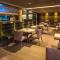 VIER Studios & Restaurant