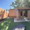 Casita con jardín privado y piscina compartida