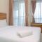 Comfort and Modern Studio Tifolia Apartment By Travelio