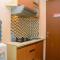 Comfort and Modern Studio Tifolia Apartment By Travelio
