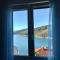 Apartment Noemi with a direct beach view