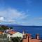 Apartment Noemi with a direct beach view