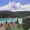 Apartment Noemi with a direct beach view