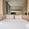 Fully Furnished with New Design Studio Ciputra International Apartment By Travelio