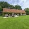 Former stables converted into a beautiful rural holiday home with a common sauna and swimming pool