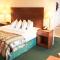Magnuson Grand Pioneer Inn and Suites - إسكانابا