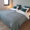 Vakantiewoning Ijzerfront 14-18- Ruim 2-slpk appartement met terras & privéparking