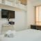 Chic and Cozy Studio at Tifolia Apartment By Travelio