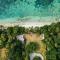 Whispering Palms - Absolute Beachfront Villas
