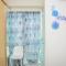 Cozy Stay 1BR at Grand Kamala Lagoon Apartment By Travelio