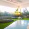 Cozy Stay 1BR at Grand Kamala Lagoon Apartment By Travelio